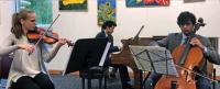 Musicians playing music on various instruments.